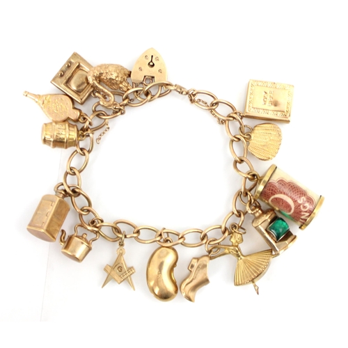 284 - A yellow metal charm bracelet, the curb link bracelet suspending yellow metal and gold coloured char... 