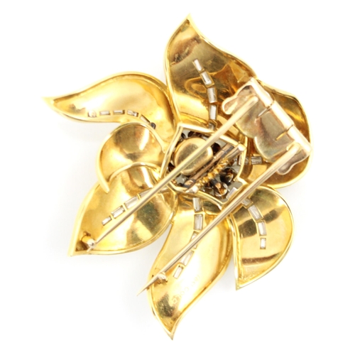 290 - A yellow metal and diamond set brooch, the stylised matte petals with flowing line of baguette cut d... 