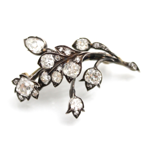 297 - A 19th century diamond spray brooch, the white metal spray brooch with mixed cut old cut diamonds se... 