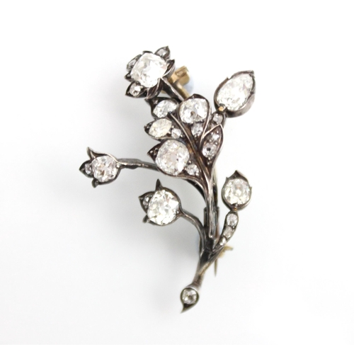 297 - A 19th century diamond spray brooch, the white metal spray brooch with mixed cut old cut diamonds se... 