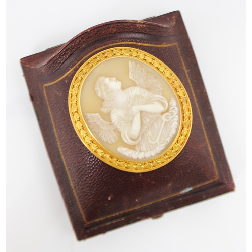 298 - A 19th century cased cameo, the oval cameo depicting a winged goddess with anchor detail, within a g... 