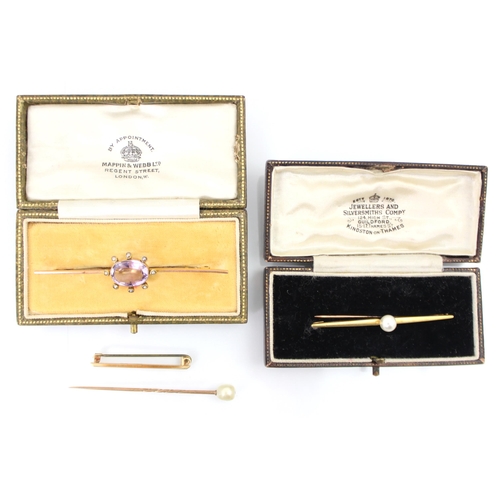 300 - A selection of bar brooches, including a 9ct yellow gold amethyst and seed pearl set bar brooch, the... 