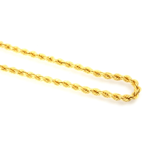 301 - A yellow metal rope twist chain, the chain with hook fitting stamped 'MC 916' overall length 44cm, 1... 