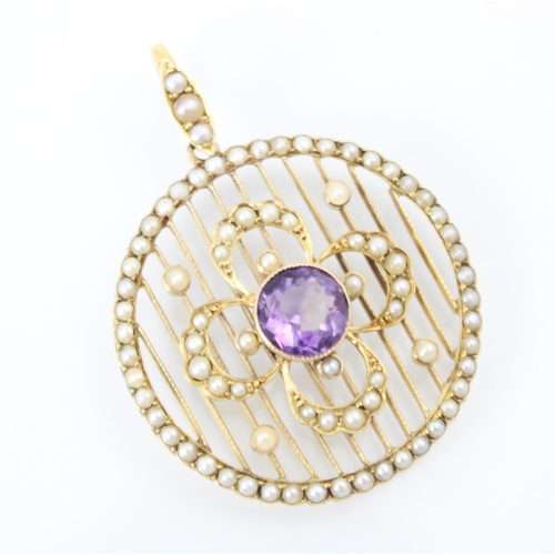 314 - An Edwardian style amethyst and split pearl pendant, the circular openwork pendant with surround of ... 