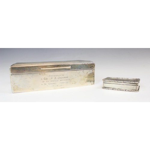 32 - A William IV silver presentation box, possibly John Tongue, Birmingham 1825, the hinged cover engrav... 