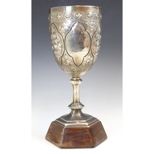 74 - A Victorian silver presentation cup, George Unite and Sons, Birmingham 1880, the profusely embossed ... 