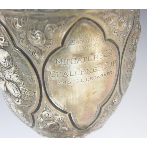 74 - A Victorian silver presentation cup, George Unite and Sons, Birmingham 1880, the profusely embossed ... 