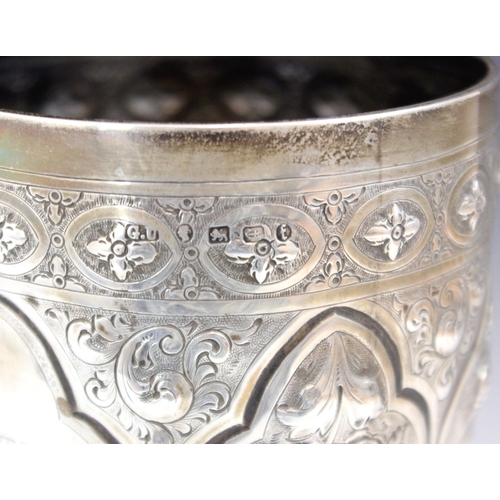 74 - A Victorian silver presentation cup, George Unite and Sons, Birmingham 1880, the profusely embossed ... 