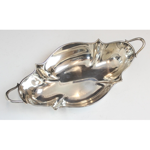 83 - An Edwardian silver dish, Atkin Brothers, Sheffield 1904, the shaped quatrefoil dish with twin loop ... 