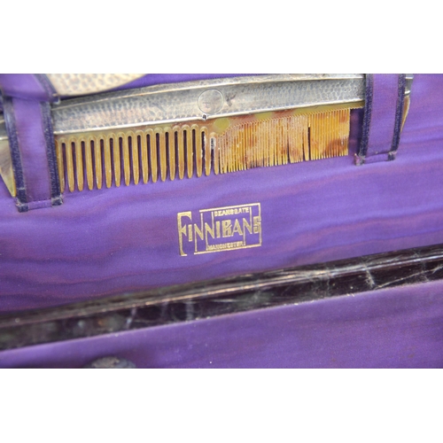 393 - A Finnigans of Manchester travel vanity case, the aubergine coloured faux crocodile skin case openin... 