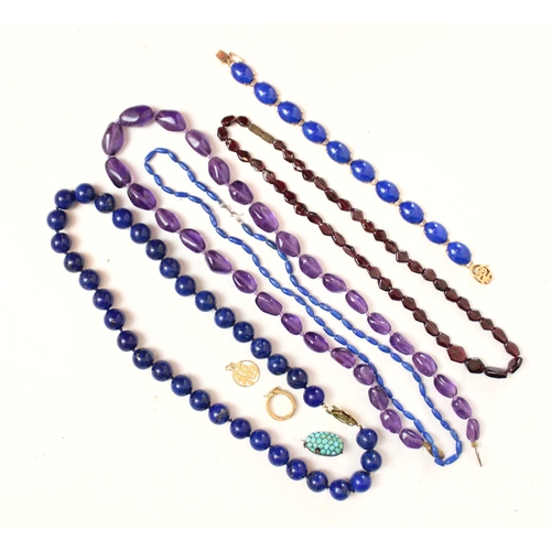 305 - A selection of jewellery, including a lapis lazuli cabochon cut bracelet, with clasp stamped indisti... 