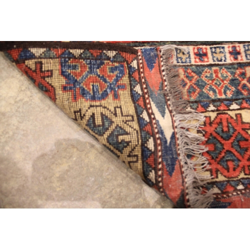 935 - A Qashqai Persian type runner, in red, blue and cream colourways, the four alternating rectangular m... 