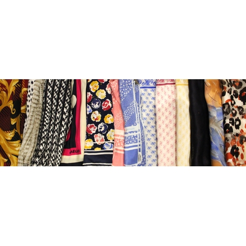 439 - Fourteen silk scarves by Jaeger, of varying shapes, sizes and designs to include, animal print, abst... 