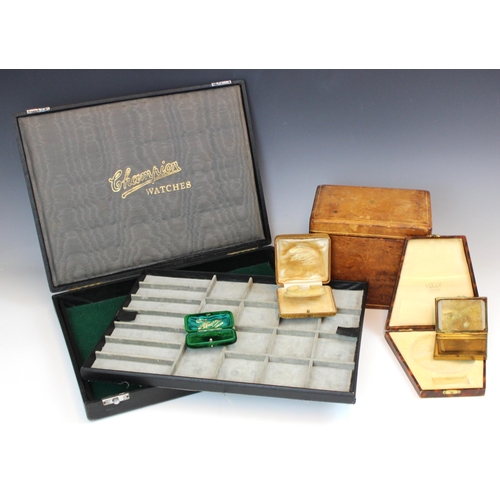 338 - A group of vacant jewellery boxes, including a Champion watch travel case, the case with lift out co... 