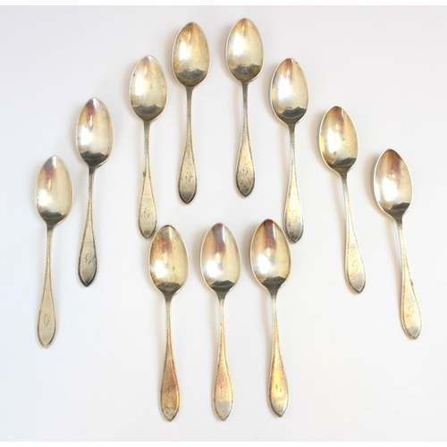 73 - A set of eleven Victorian silver Sandringham pattern style teaspoons, Walker and Hall, Sheffield 189... 