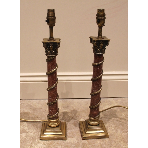 816 - A pair of rouge marble and brass table lamps, probably Besselink & Jones, late 20th century, the mar... 