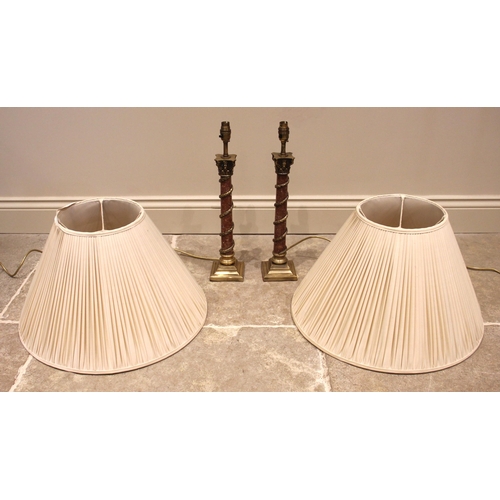 816 - A pair of rouge marble and brass table lamps, probably Besselink & Jones, late 20th century, the mar... 