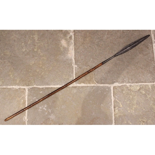 350 - An African Assegai throwing spear, late 19th or early 20th century, the wrought steel blade set to a... 