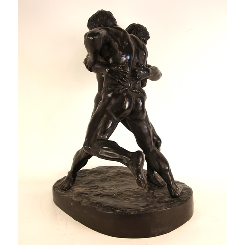 375 - A bronze figural group, early 20th century, modelled as two scantily clad wrestlers, unsigned, 78cm ... 