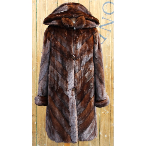 413 - A ladies hooded and reversible winter three-quarter length mink fur coat, late 20th century, with ro... 