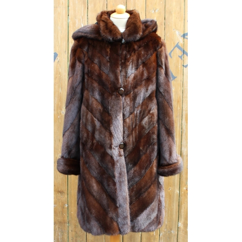 413 - A ladies hooded and reversible winter three-quarter length mink fur coat, late 20th century, with ro... 