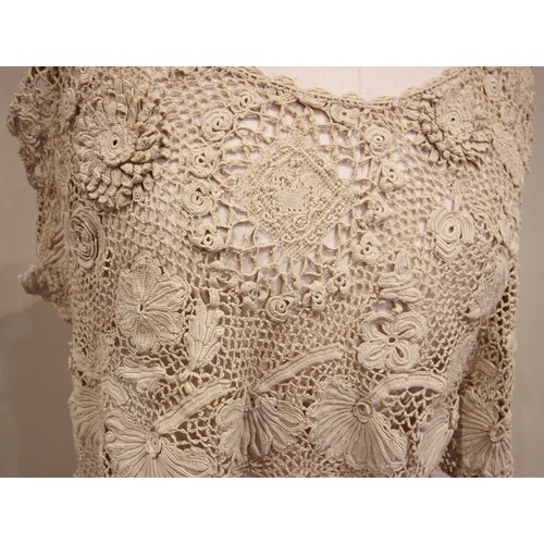 919 - An early 20th century crochet dress, the blonde crochet dress in two pieces formed as a sleeveless b... 