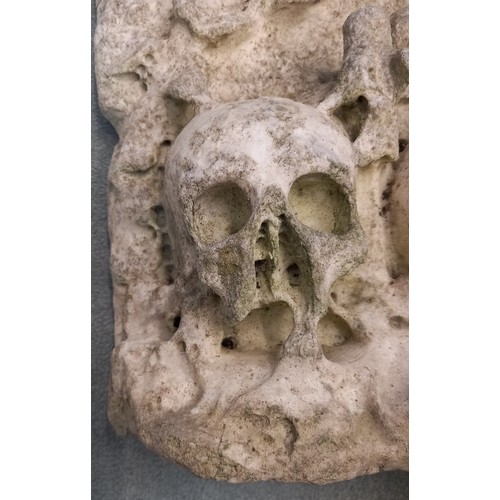 387 - A carved stone memento mori fragment, possibly alabaster, modelled in the 15th century Nottingham ma... 