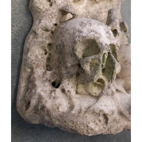 387 - A carved stone memento mori fragment, possibly alabaster, modelled in the 15th century Nottingham ma... 