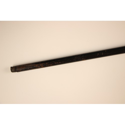 386 - A Burmese silver topped walking cane, 19th century, the tapered ebonised cane terminating with a hea... 