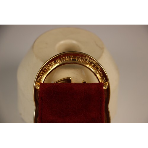 420 - A Gucci red suede leather belt, stamped 'Made in Italy by Gucci' with attached gilt metal double G l... 