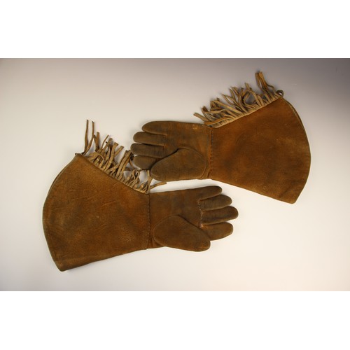 917 - A pair of 'Victorian' suede lined driving gloves, the cuff and hand section decorated with beaded fl... 