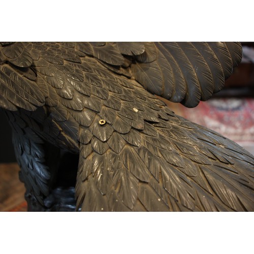 760 - Manner of Genryusai Seiya, Meiji Period (1868-1912), a large and impressive bronze eagle, modelled w... 