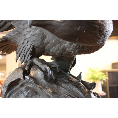 760 - Manner of Genryusai Seiya, Meiji Period (1868-1912), a large and impressive bronze eagle, modelled w... 