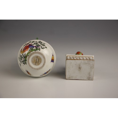 690 - A porcelain model of a hyacinth, 20th century, set to a bowl decorated with exotic birds in the mann... 