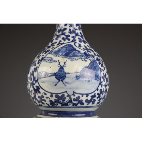 788 - A large Chinese porcelain blue and white double gourd vase, 19th century, the lower body decorated w... 