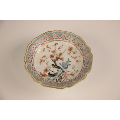 766 - A Chinese porcelain square stem-bowl, Tongzhi (1862-1874), decorated in the famille rose palette dep... 