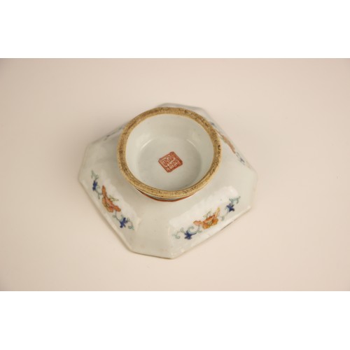 766 - A Chinese porcelain square stem-bowl, Tongzhi (1862-1874), decorated in the famille rose palette dep... 