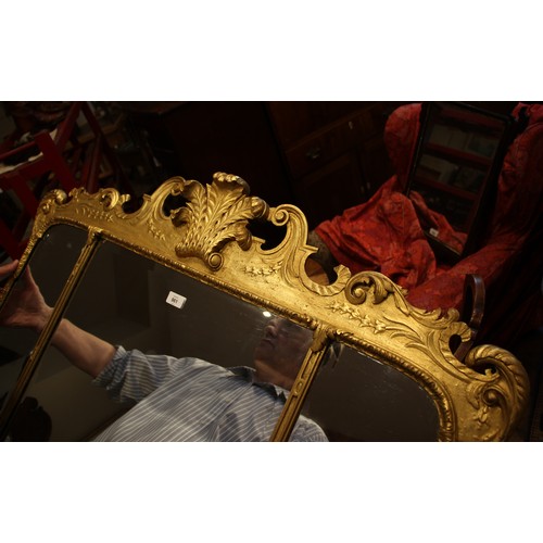 961 - A George II style giltwood and gesso overmantel triple plate wall mirror, the Prince of Wales feathe... 