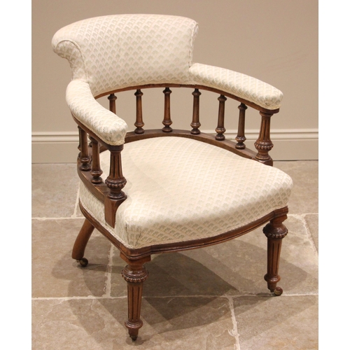 1004 - A Victorian walnut library tub chair, in the manner of Holland and Sons, re-upholstered in damask fa... 