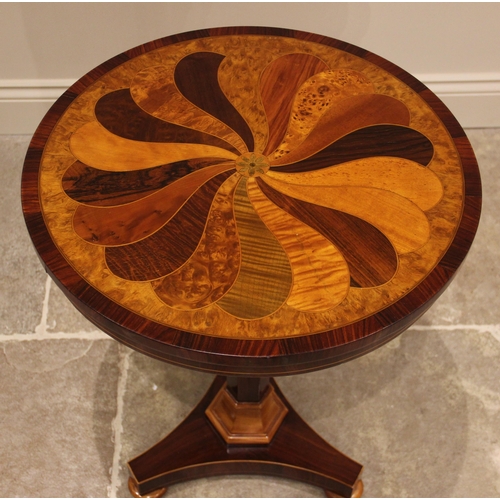 1013 - A mid to late 19th century rosewood and specimen inlaid pedestal table, the circular top inlaid with... 