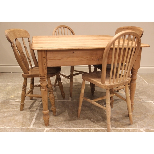 1020 - A Victorian style pine kitchen table and four matched chairs, the table with a rectangular moulded t... 