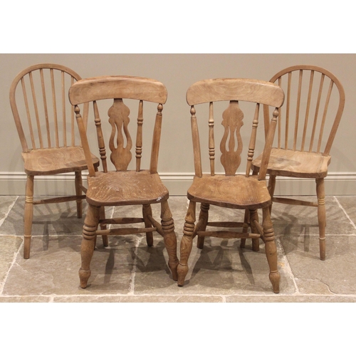 1020 - A Victorian style pine kitchen table and four matched chairs, the table with a rectangular moulded t... 