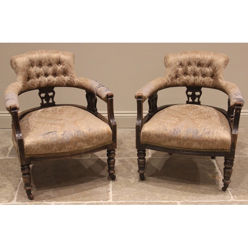 1034 - An Edwardian three piece stained beech salon suite, comprising a pair of button back tub chairs, the... 