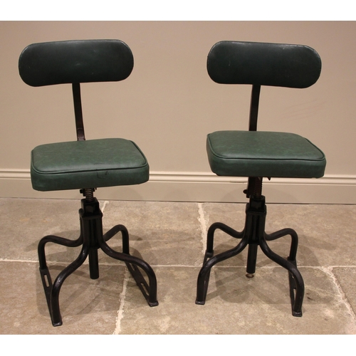 1039 - A pair of painted metal machinists chairs, mid 20th century, worn makers label 'Dual' to the rear, e... 