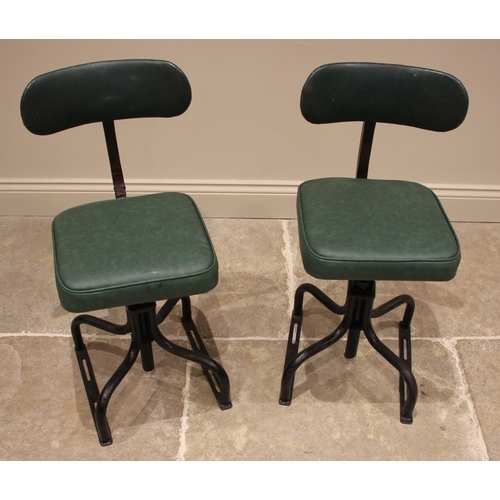 1039 - A pair of painted metal machinists chairs, mid 20th century, worn makers label 'Dual' to the rear, e... 