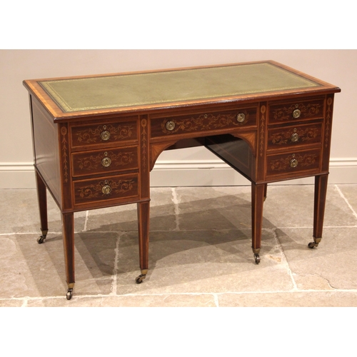 1048 - An Edwardian Sheraton Revival writing desk, by Edwards & Roberts, the rectangular top inset with a g... 