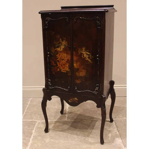 1051 - A French Vernis Martin lacquered music cabinet, early 20th century, the moulded top applied with a l... 