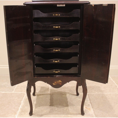 1051 - A French Vernis Martin lacquered music cabinet, early 20th century, the moulded top applied with a l... 