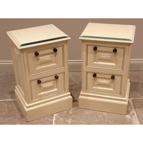 1070 - A pair of painted bedside cupboards, possibly Theodore Alexander, early 21st century, each of panell... 