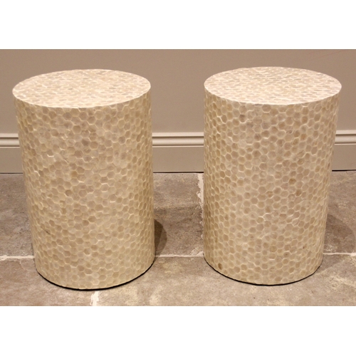 1074 - A pair of contemporary mother of pearl 'honeycomb' pedestals/occasional tables, of cylindrical form,... 